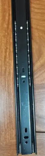 Cushioned steel ball three rail